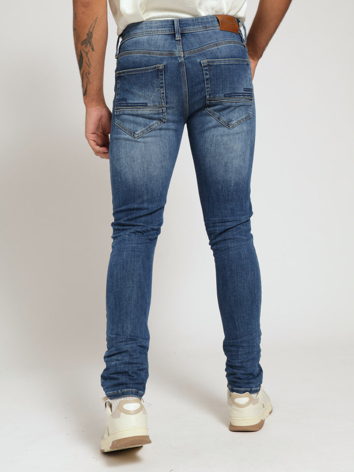 William Slim Leg Denim Jean - Medium Wash