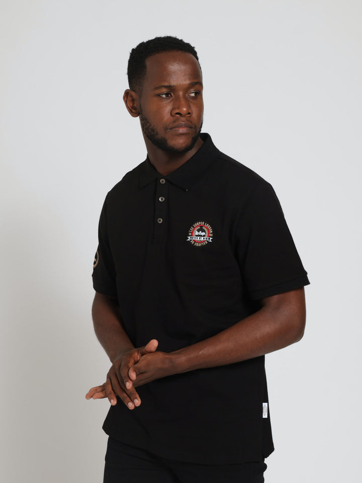 Bradley Embossed Crest Golfer - Black