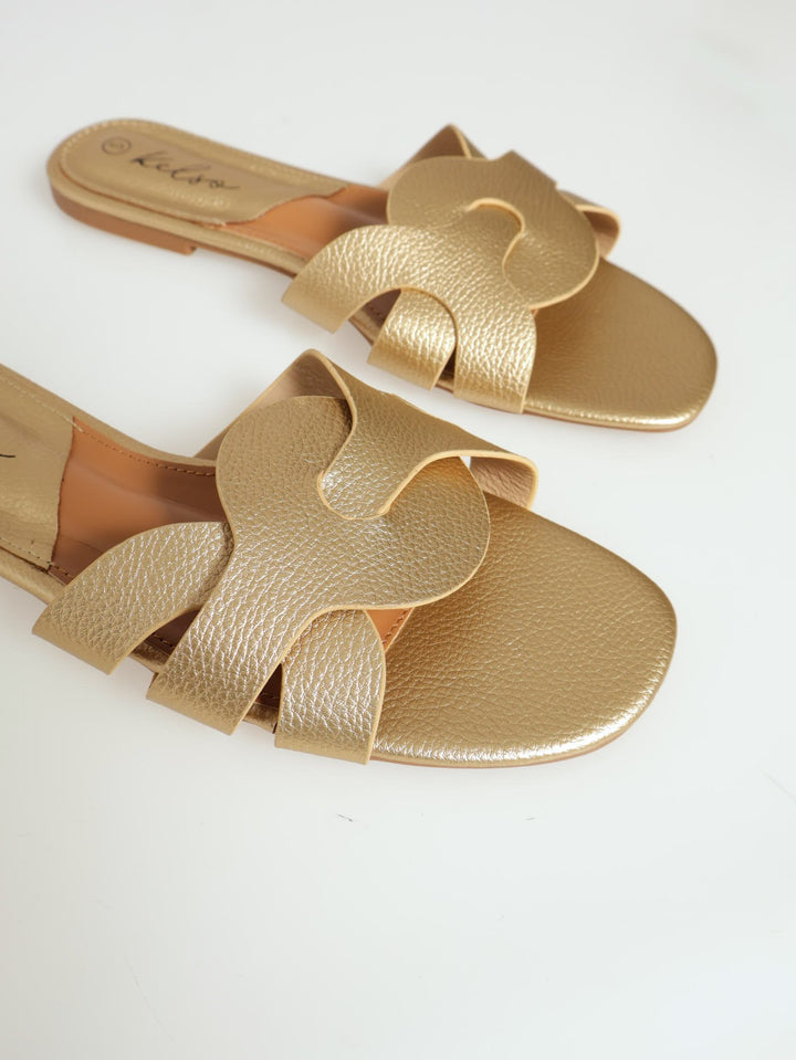 Interlock Strap Pebble Grain Mule Sandal - Gold